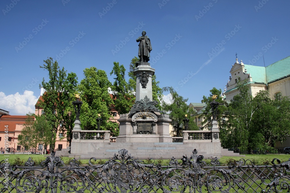 Monument of polish poet Adam Mickiewicz at Krakowskie Przedmiescie street in Warsaw, Poland.