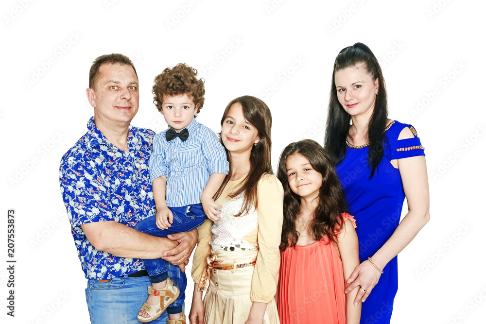 Happy mature family with three child standing together isolated on white Happy mature family with three child standing together isolated on white