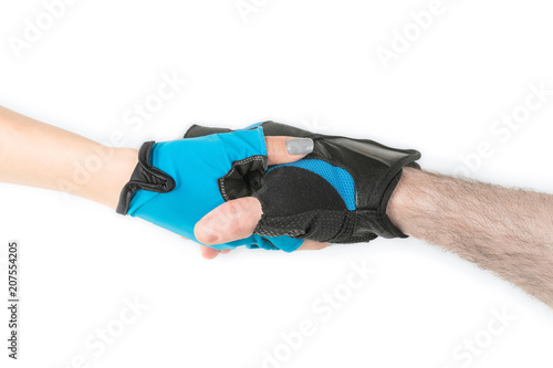 Man and woman hands in sport gloves handshake isolated
