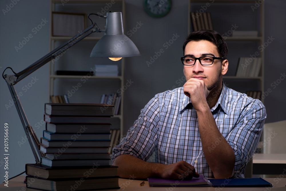 Student preparing for exams late at night Student preparing for exams late at night