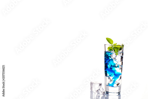 cocktail glass with blue alcoholic drink , close-up isolated on white.