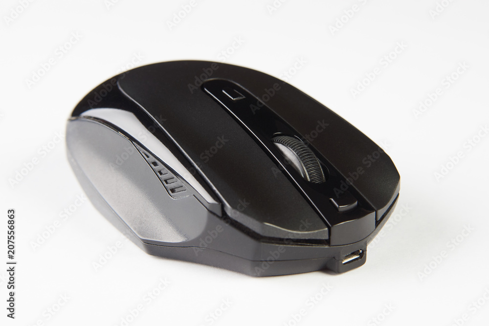 Black optical computer mouse. Wireless computer mouse isolated on white background, close-up Black optical computer mouse. Wireless computer mouse isolated on white background, close-up