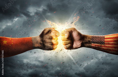 Close up clash of two fists. Conflict Concept © chaiyapruek