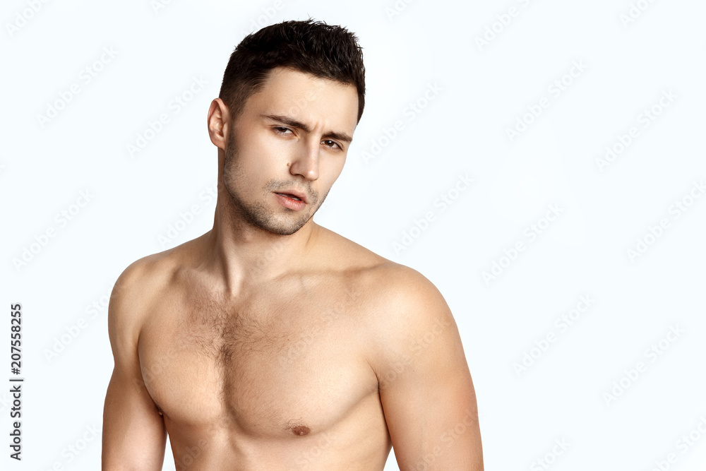 Sport guy with white towel on white background Sport guy with white towel on white background
