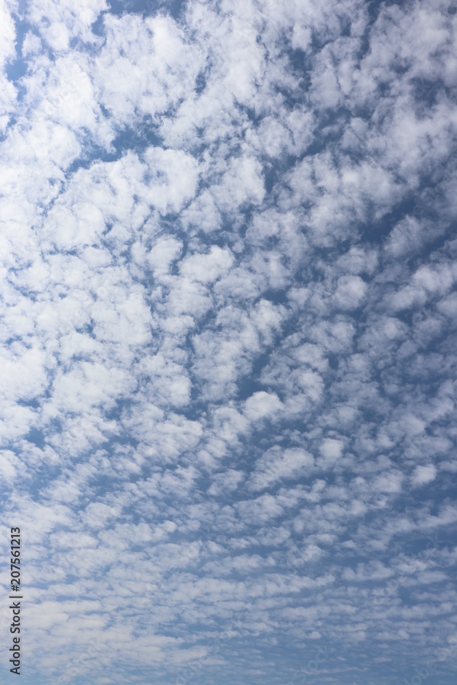 Close up of fluffy white clouds against blue sky Close up of fluffy white clouds against blue sky
