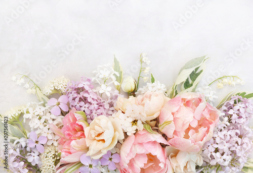 Tablou pe pânză Delicate tulips on blooming spring flowers festive background, summer blossoming