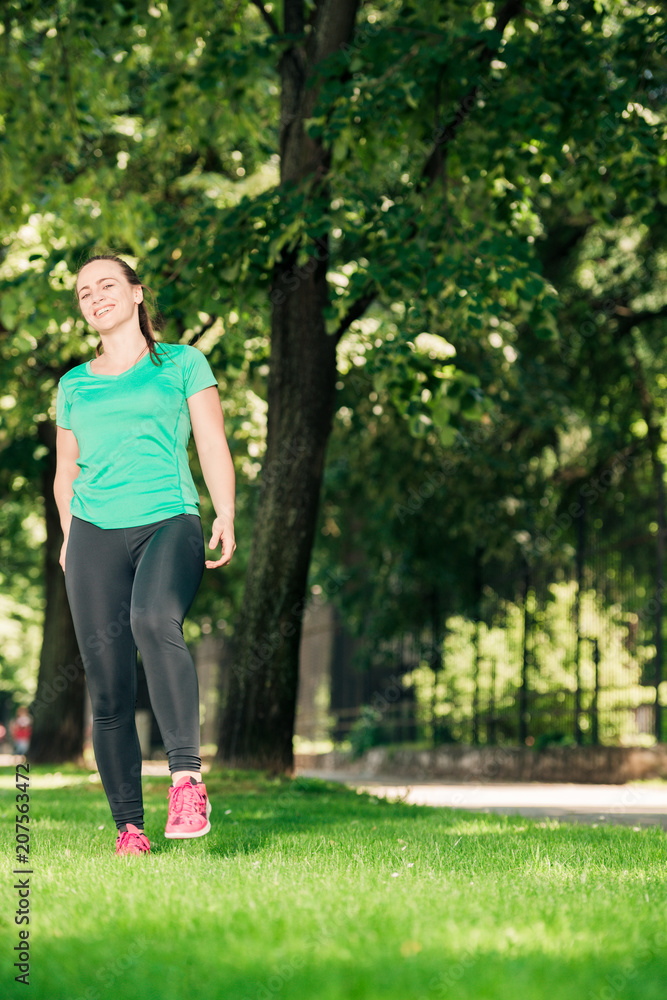 HEALTHY YOUNG WOMAN OUT JOGGING HEALTHY YOUNG WOMAN OUT JOGGING