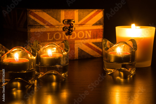 Photography Four candles and a london box in a black frame
