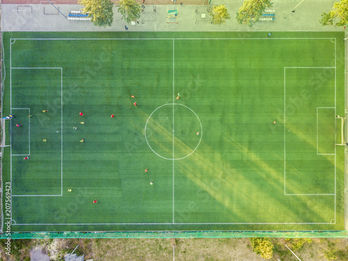 Photography aerial top down view of two national footbal teams warm up before world cup camp