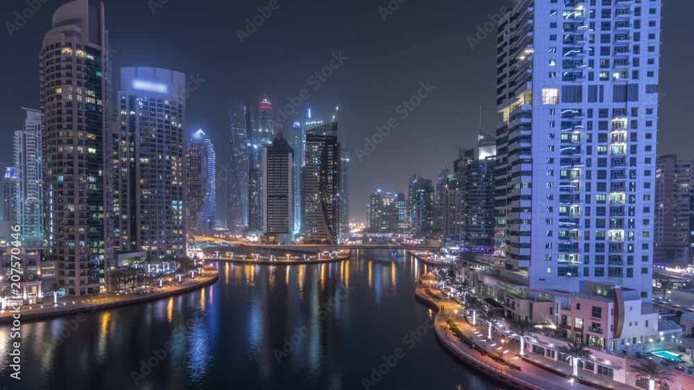 Water canal on Dubai Marina skyline at night timelapse. Water canal on Dubai Marina skyline at night timelapse.
