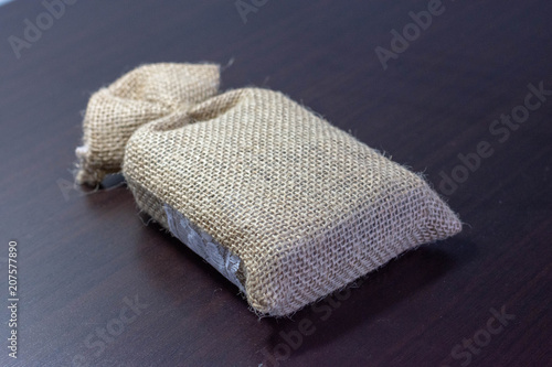 A stack of clean, folded towels in various colors like white, pink, blue, and green, made of soft cotton, isolated on a white background, representing a neat bathroom textile arrangement