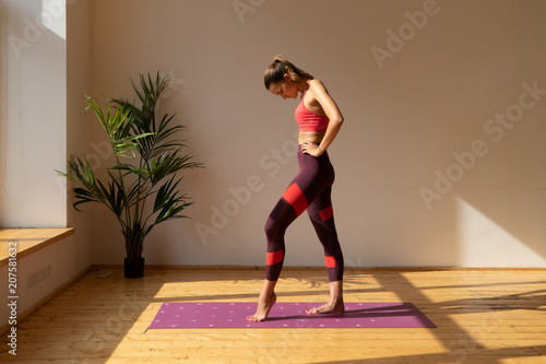 young slim woman in sunny training class, ready to fitness workout