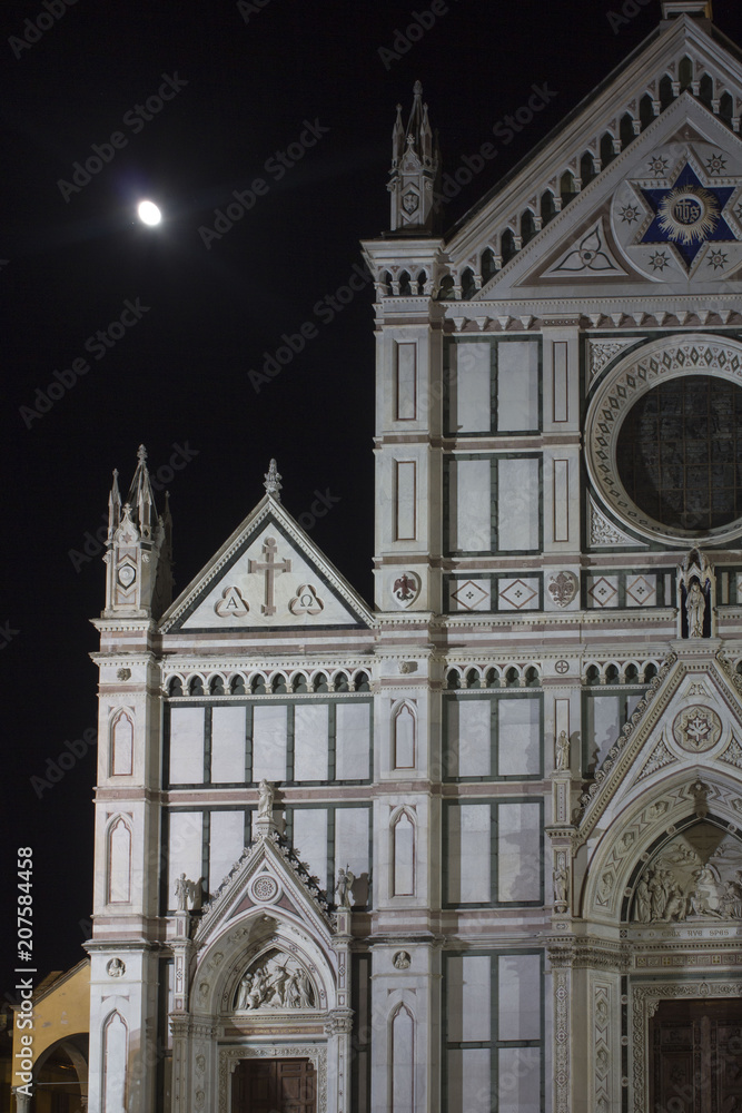 Detail of the facade of Santa Croce church in Florence at night