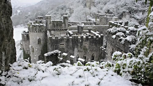 Gwrych castle ruins with gently falling snow, magical European Welsh castle, main building