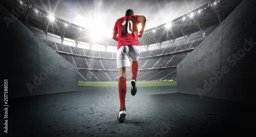 Billede på lærred Soccer player entering the 3d imaginary stadium