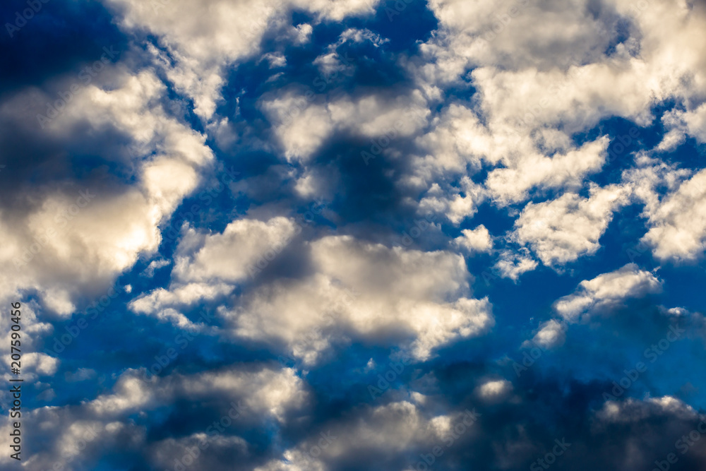 colorful dramatic sky with cloud at sunset.