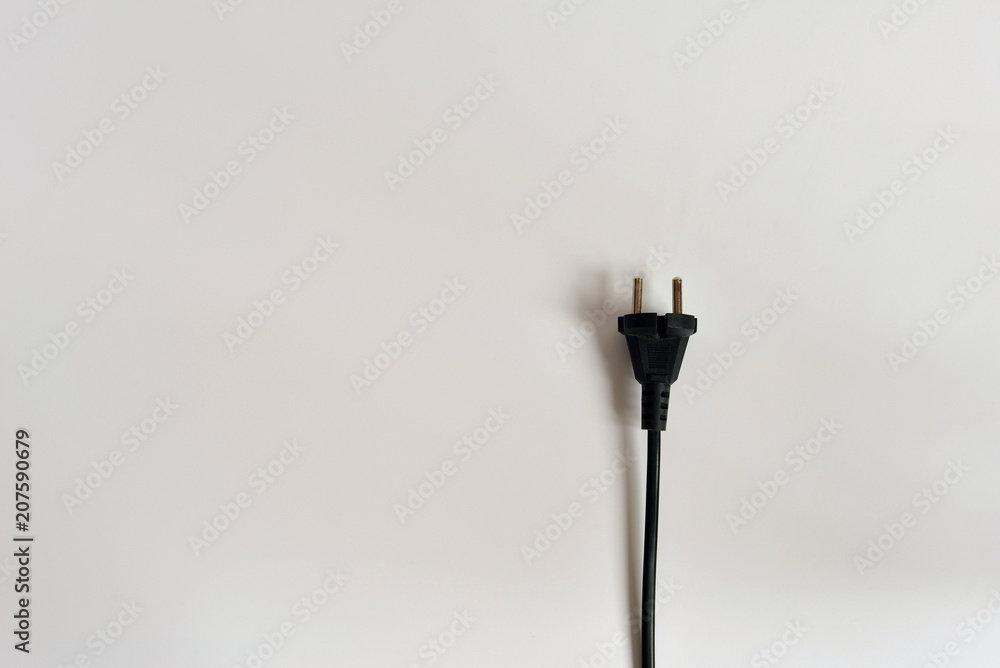 Cord with a plug on a white background. Cord from the appliance. Cord with a plug on a white background. Cord from the appliance.
