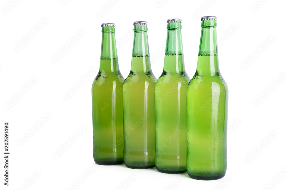 Four bottles of beer isolated on white background Four bottles of beer isolated on white background