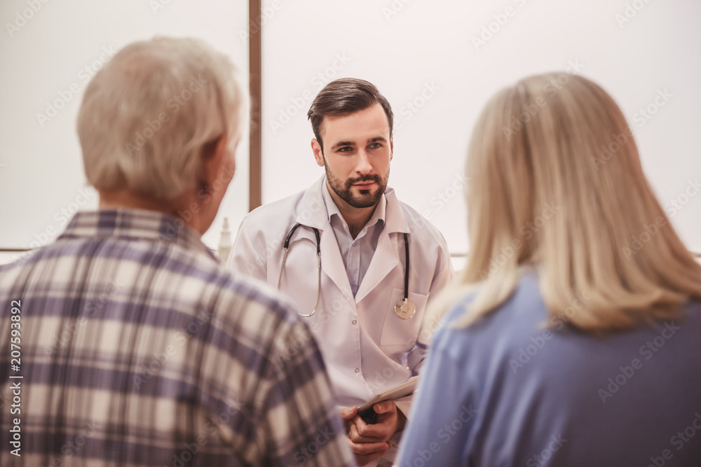 Old couple and doctor Old couple and doctor