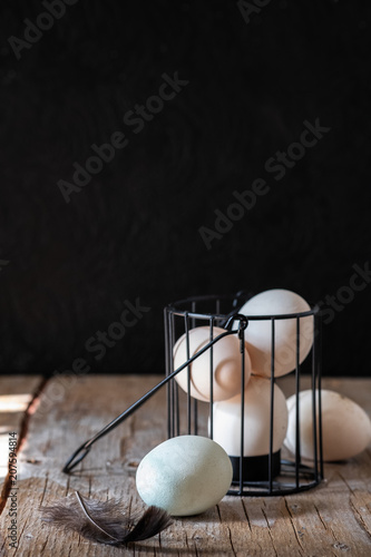 raw eggs on a black background