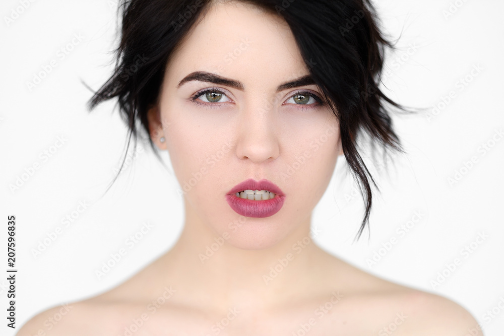 emotion face. confident sexy woman. fashion shot. young beautiful brunette girl portrait on white background. emotion face. confident sexy woman. fashion shot. young beautiful brunette girl portrait on white background.