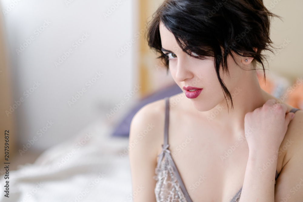 seduction sex and flirt concept. young sexy playful sensual hot brunette  girl in lingerie in her bedroom Stock Photo | Adobe Stock
