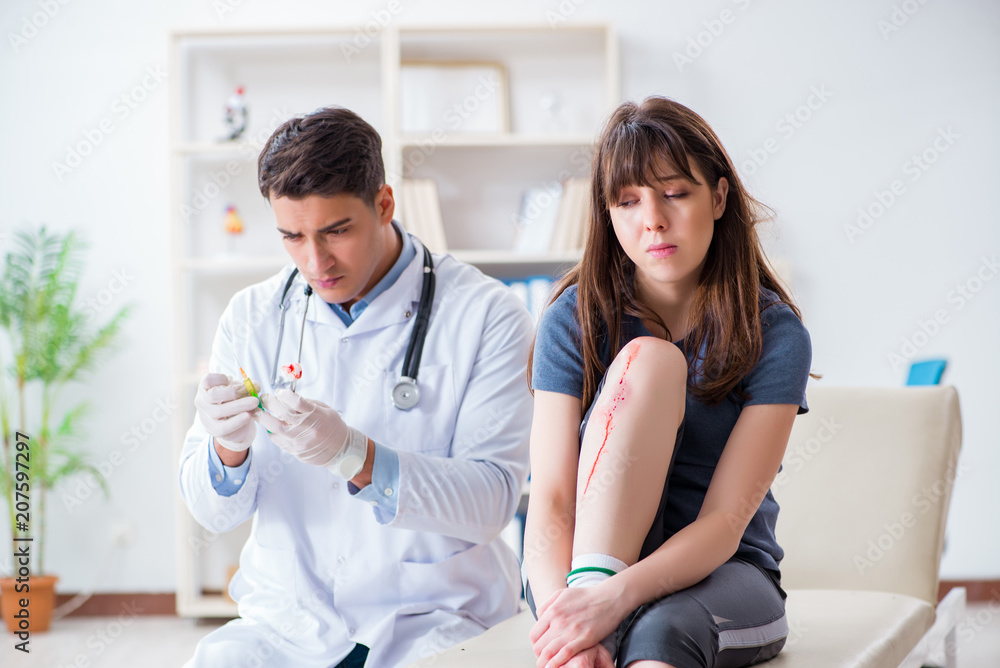 Fototapeta premium Patient visiting doctor after sustaining sports injury