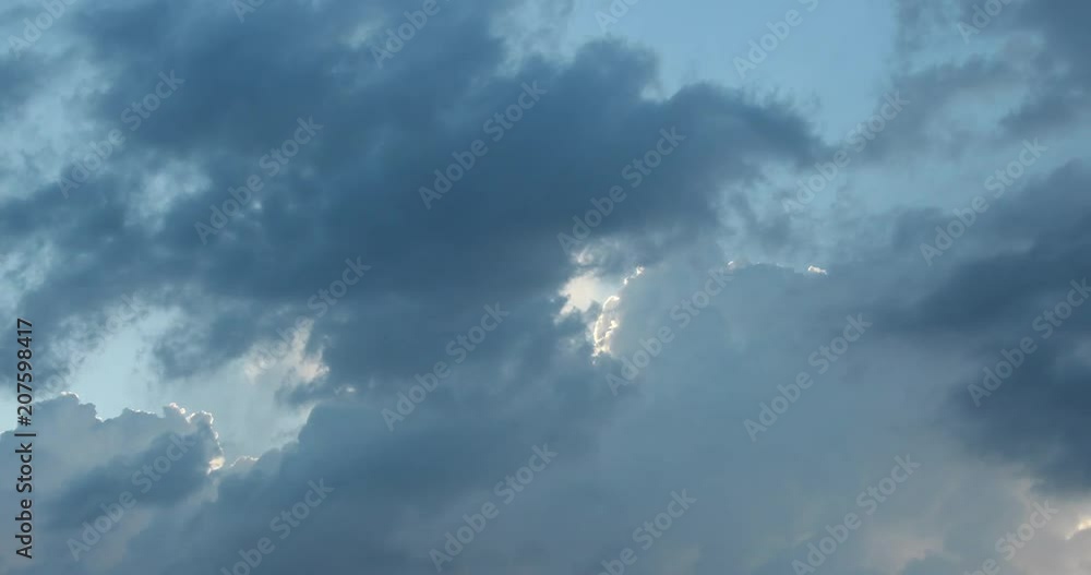 cumulus clouds with shining edges in the sun cumulus clouds with shining edges in the sun