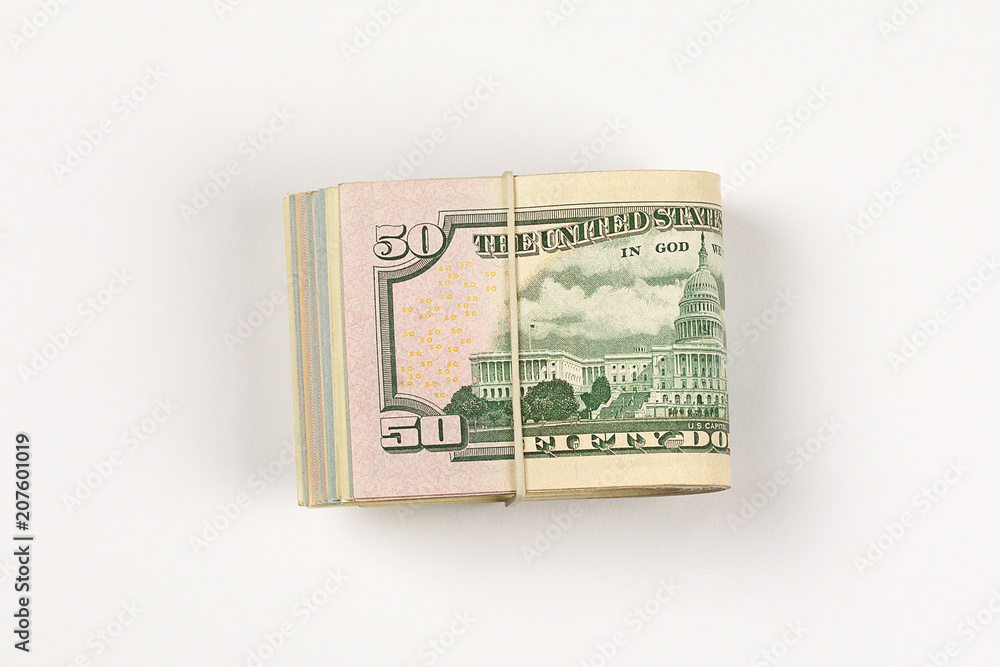 Stack of USA 50 dollars isolated on white background. Stack of USA 50 dollars isolated on white background.
