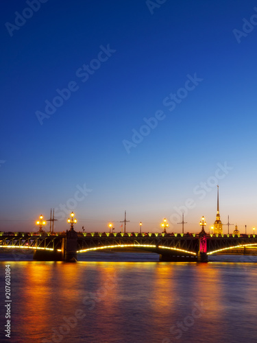 Peter and Paul Fortress and Trinity Bridge at night. Season of white nights. Saint-Petersburg, Russia