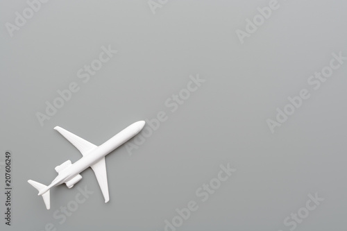 Toy plane on gray background