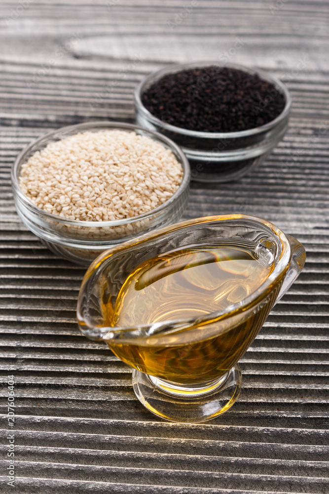 fresh sesame seeds on a rustic background fresh sesame seeds on a rustic background