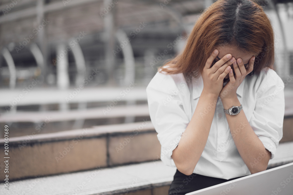 Fototapeta premium a woman in feeling exhausted and depressed from frustrated. anxiety concept.