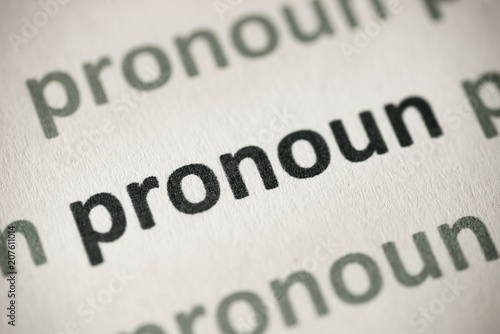 word pronoun printed on paper macro