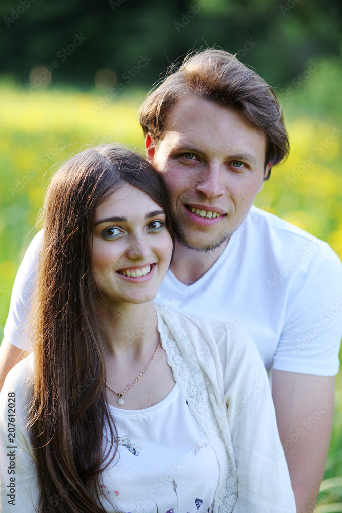 Young couple walking in the woods