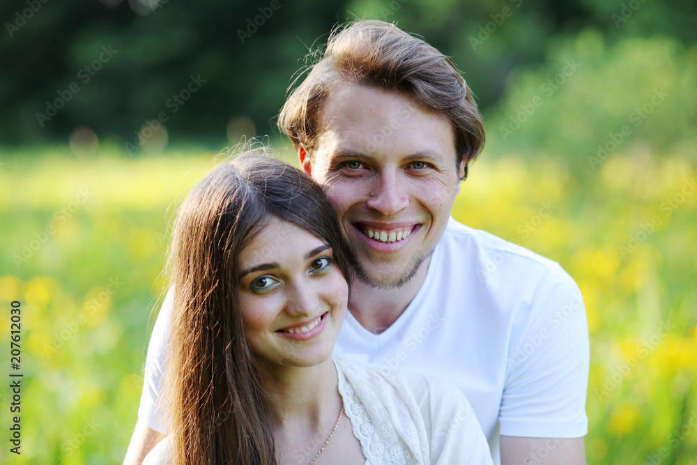 Obraz premium Young couple walking in the woods