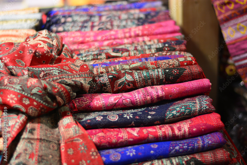 The ornamental fabrics in the souk stalls The ornamental fabrics in the souk stalls