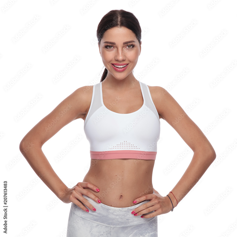 portrait of attractive brunette fitness woman standing portrait of attractive brunette fitness woman standing