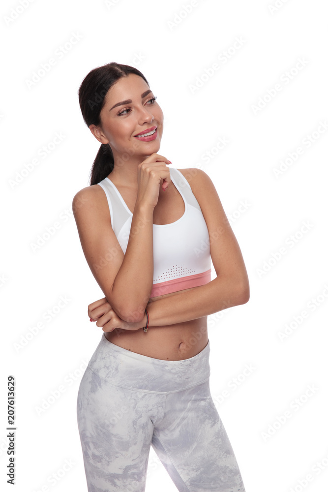 beautiful gym woman thinking and looking to side beautiful gym woman thinking and looking to side
