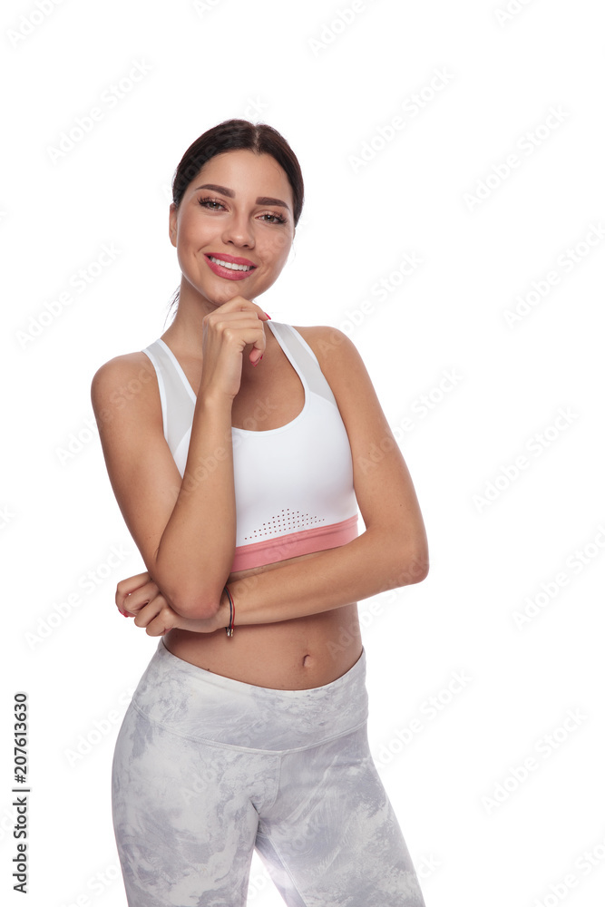 portrait of beautiful pensive fitness woman standing portrait of beautiful pensive fitness woman standing
