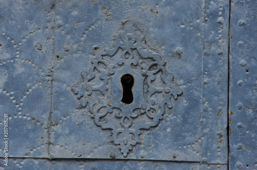 old  door lock with iron patern. Ancient temple with decorations