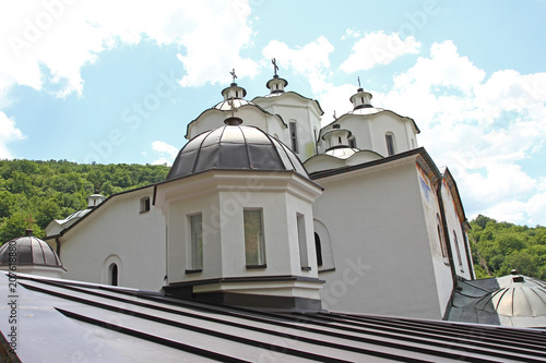 Church of Virgin Mary in a bright sunny day in east orthodox Monastery of St. Joachim of Osogovo, Kriva Palanka, Republic of Macedonia. The domes of a church. Christianity. Osogovo Monastery, Macedoni photo