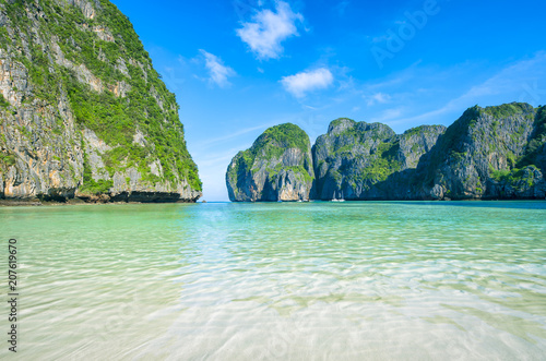 Quiet morning before the crowds arrive at Maya Bay, one of the iconic beaches of Southern Thailand which has just closed to tourists due to overcrowding and environmental concerns.