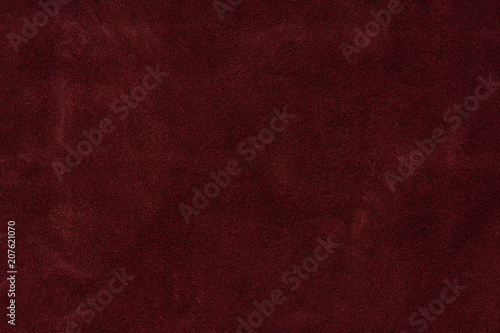 Texture background from burgundy leather suede. seamless