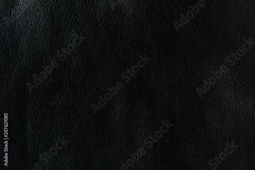 Texture background from black leather of small grain