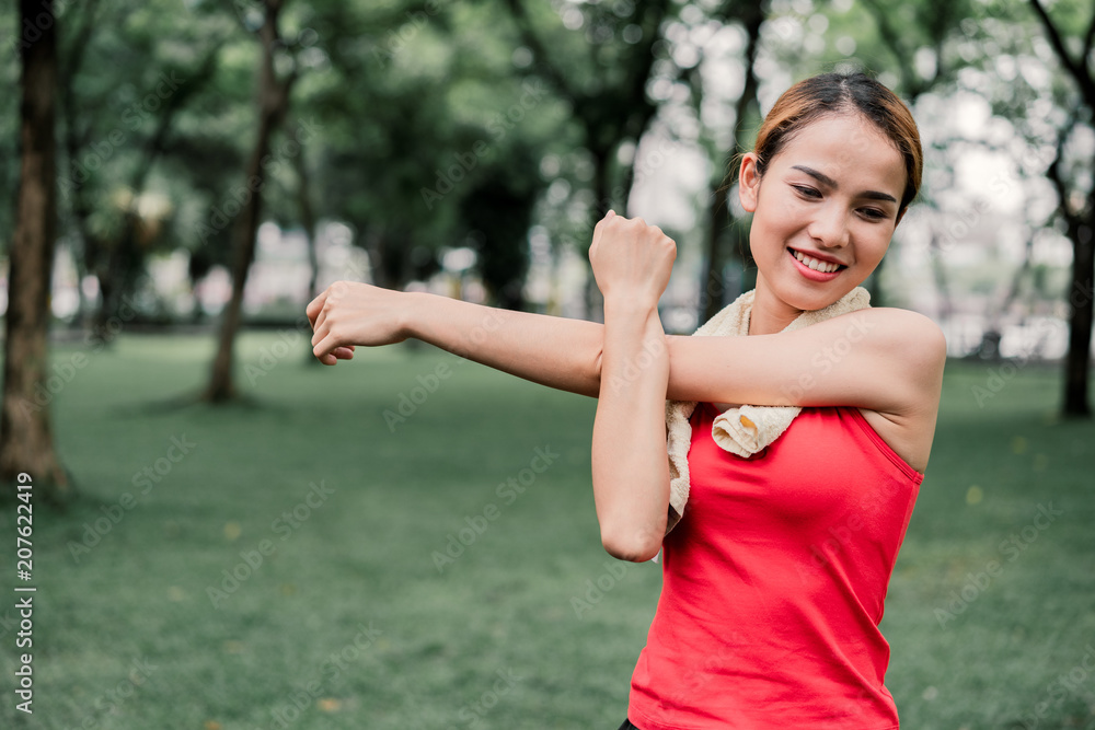 portrait strength woman stretching bicep muscle. portrait strength woman stretching bicep muscle.