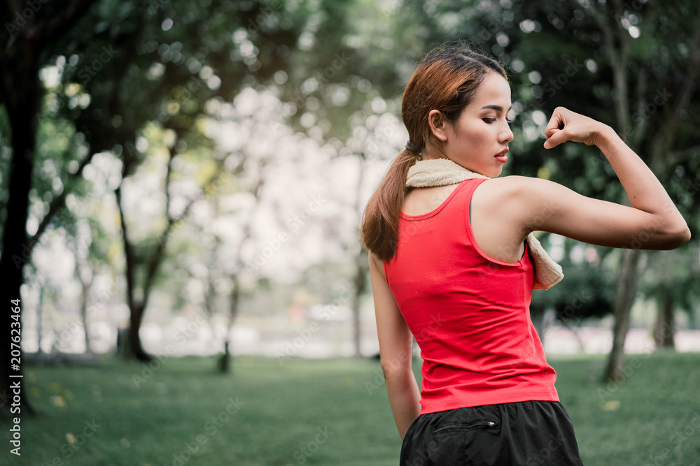 portrait strength woman bicep muscle. portrait strength woman bicep muscle.