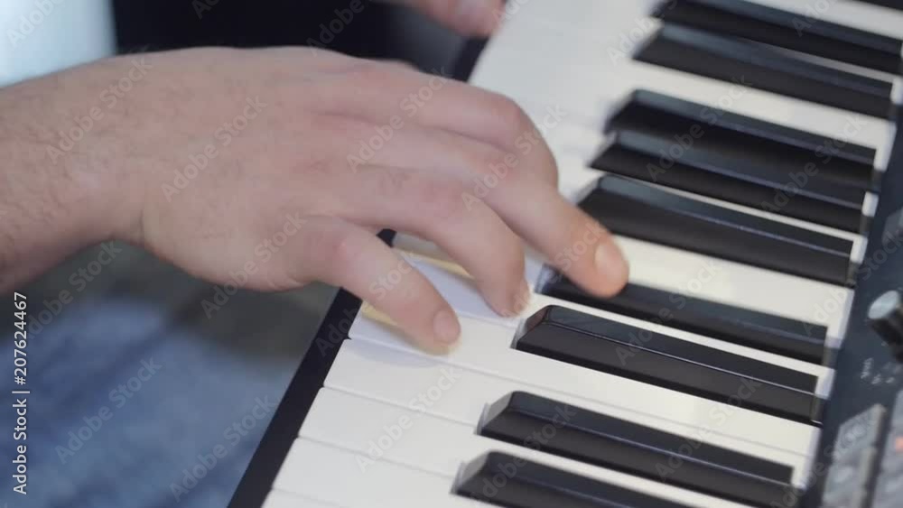 Playing on a piano with hands Playing on a piano with hands