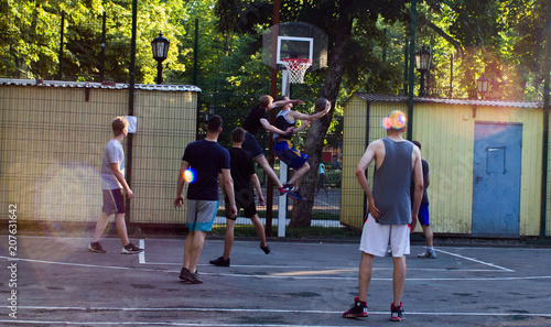 young people play Street basketball