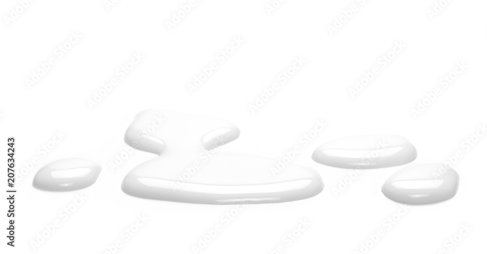 Spilled milk puddle isolated on white background and texture Spilled milk puddle isolated on white background and texture